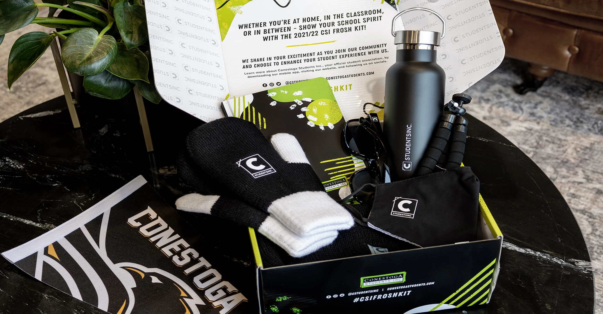 Frosh swag kit complete with custom-designed packaging and full of high-quality branded merchandise, created for post-secondary students at Conestoga College that will be shipped directly to their address.