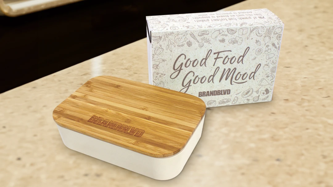 Branded Bento Box with custom box wrap sitting on counter top.