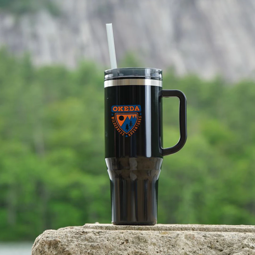 A trending, eco-friendly dupe for the Stanley 40oz tumbler, made from recycled plastic and contributes 1% of sales to environmental non-profits. This budget-friendly alternative showcases sustainable and cost-effective custom branded merch from Brand Blvd.