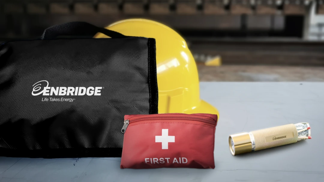 First aid kit and Stashlight LED flashlight that doubles as a secret stash compartment, branded with North America's largest energy and natural gas utility company, Enbridge Inc. to reinforce the importance of workplace safety.