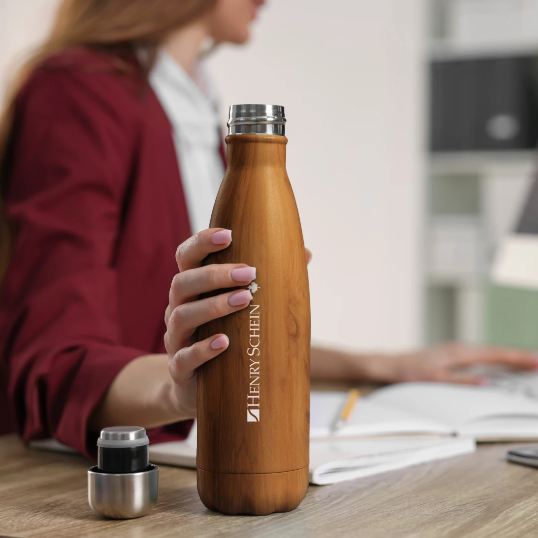 Consider sustainable promotional products for your alternative medicine practice, such as this eco-friendly reusable stainless steel water bottle, which is custom-printed with Henry Schein's logo – a worldwide distributor of medical, dental and veterinary 