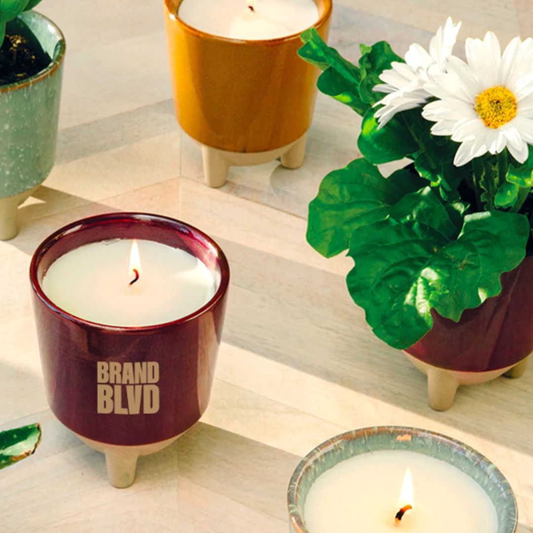 A multi-purpose company-branded soy candle that turns into a plant afterwards is a unique and engaging corporate merchandise idea as it is a punny way to showcase to customers that you will 'grow' with them.