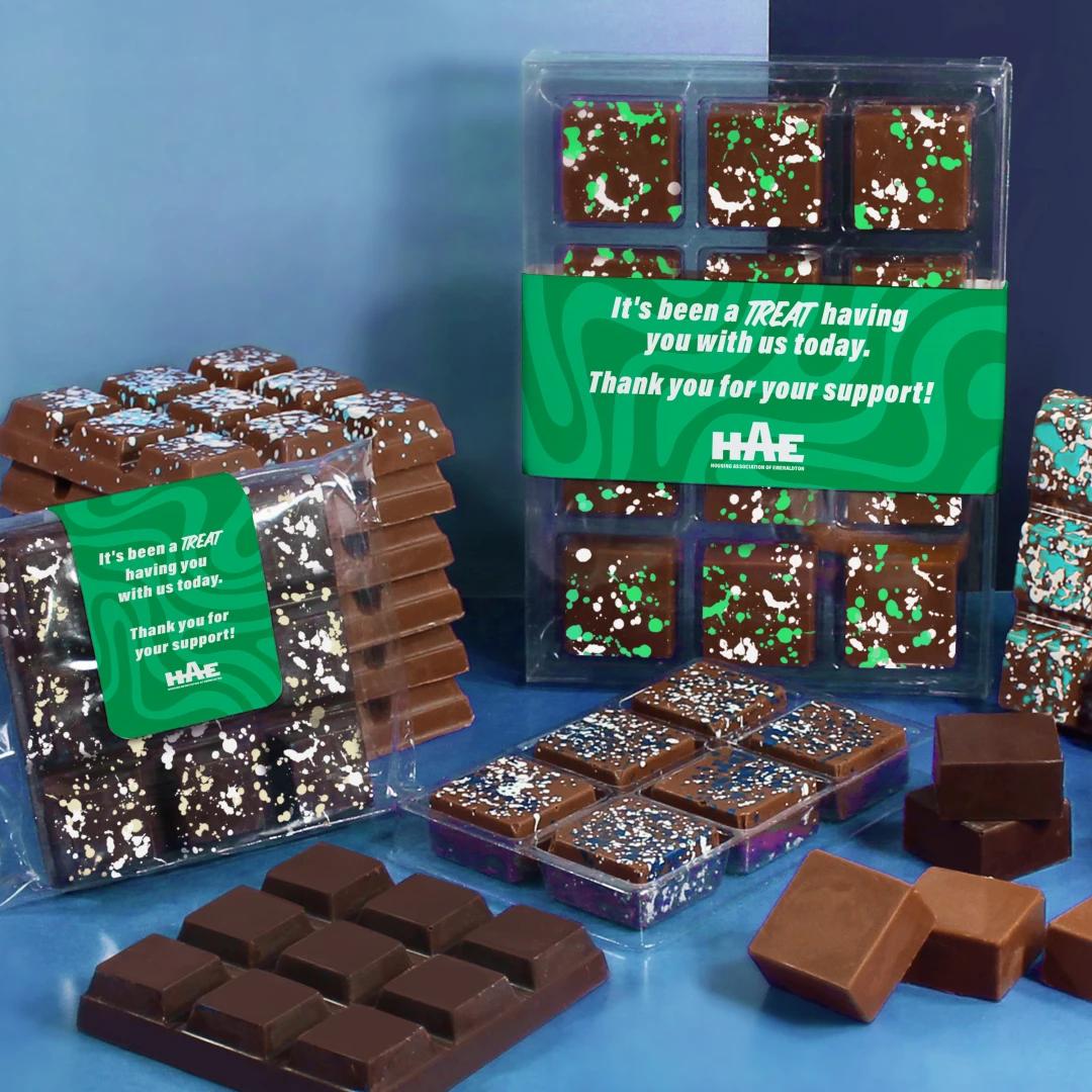 Branded chocolate bars as delightful gifts to enhance the experience for event attendees - showcasing personalized member gifts, custom branded merch, and logo products for member organizations, associations and unions.