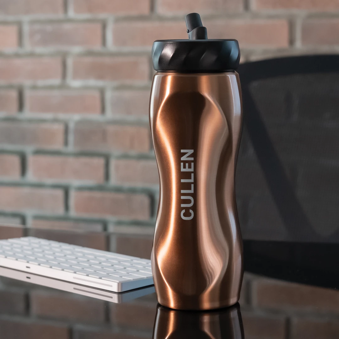 A sustainable water bottle promotional product, personalized with a person's name. An example of branded merch strategy for long-lasting brand impressions and eco-friendly swag from Brand Blvd.