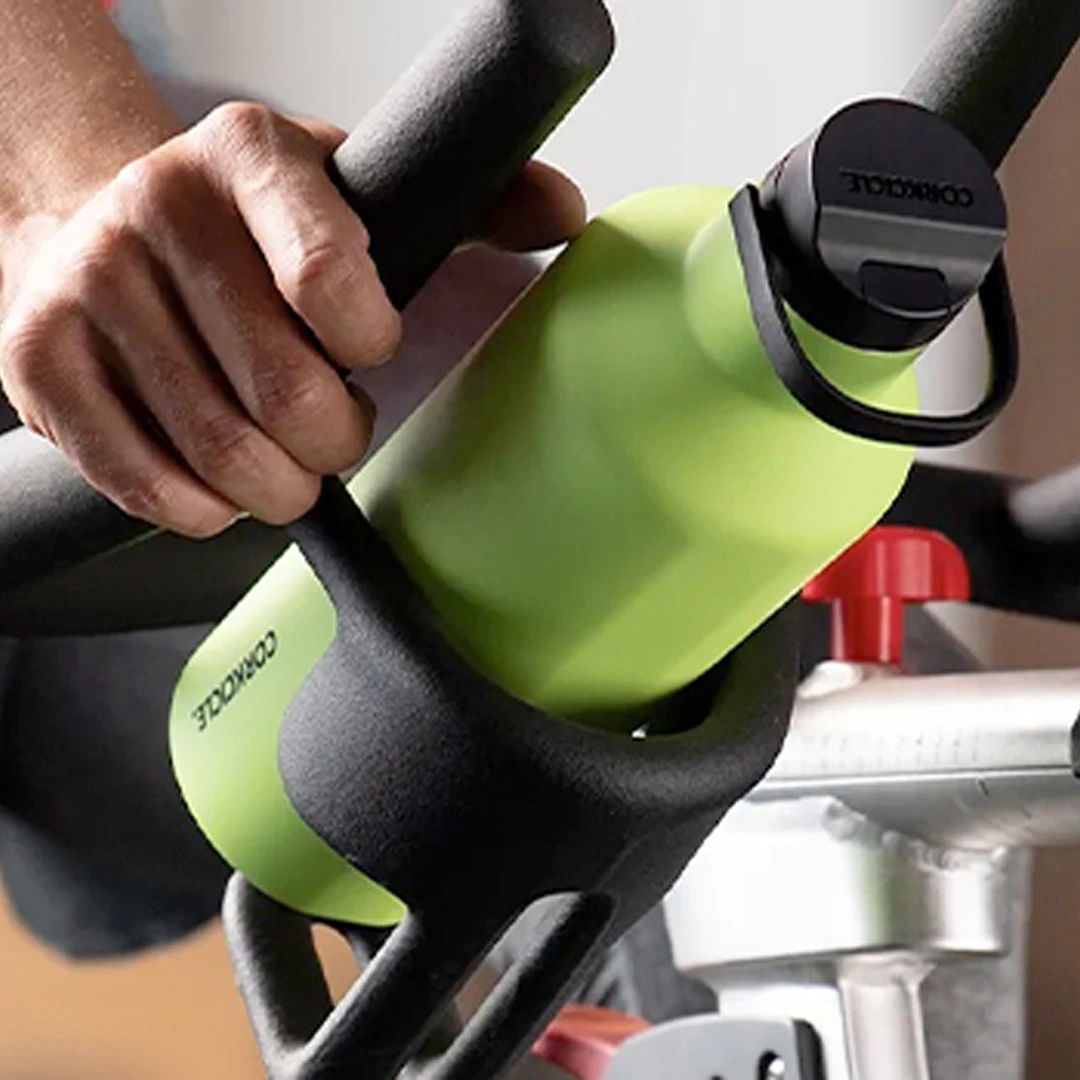 Insulated Corkcicle sport water bottle on a spin bike.