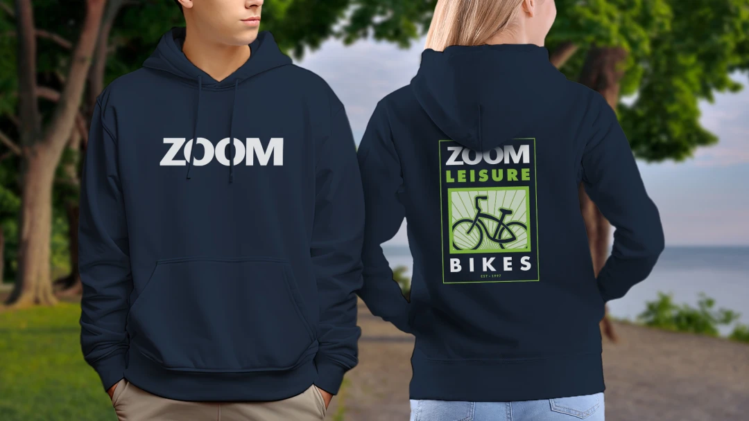 Zoom Leisure Bikes employees in logo branded hoodies, showcasing uniform ideas that are comfortable and stylish. An example of swag designed for brand engagement in the tourism industry from Brand Blvd.