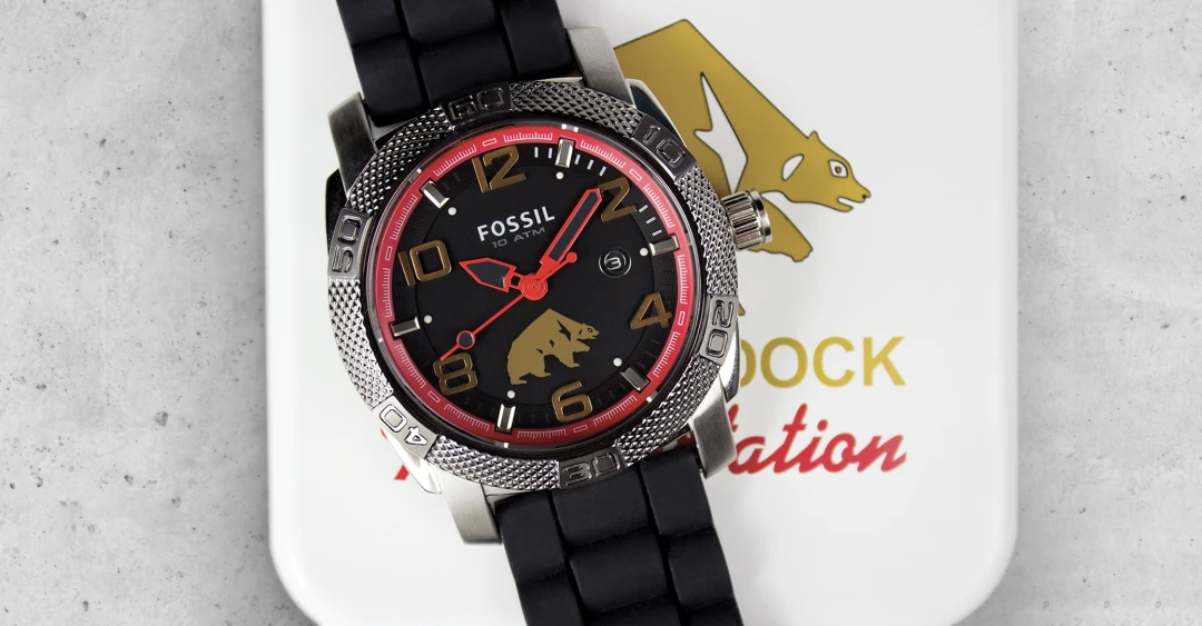 A custom Fossil retail brand watch branded for logistics and transportation company, Paddock Transport International, for high-end employee recognition and stakeholder gifting.