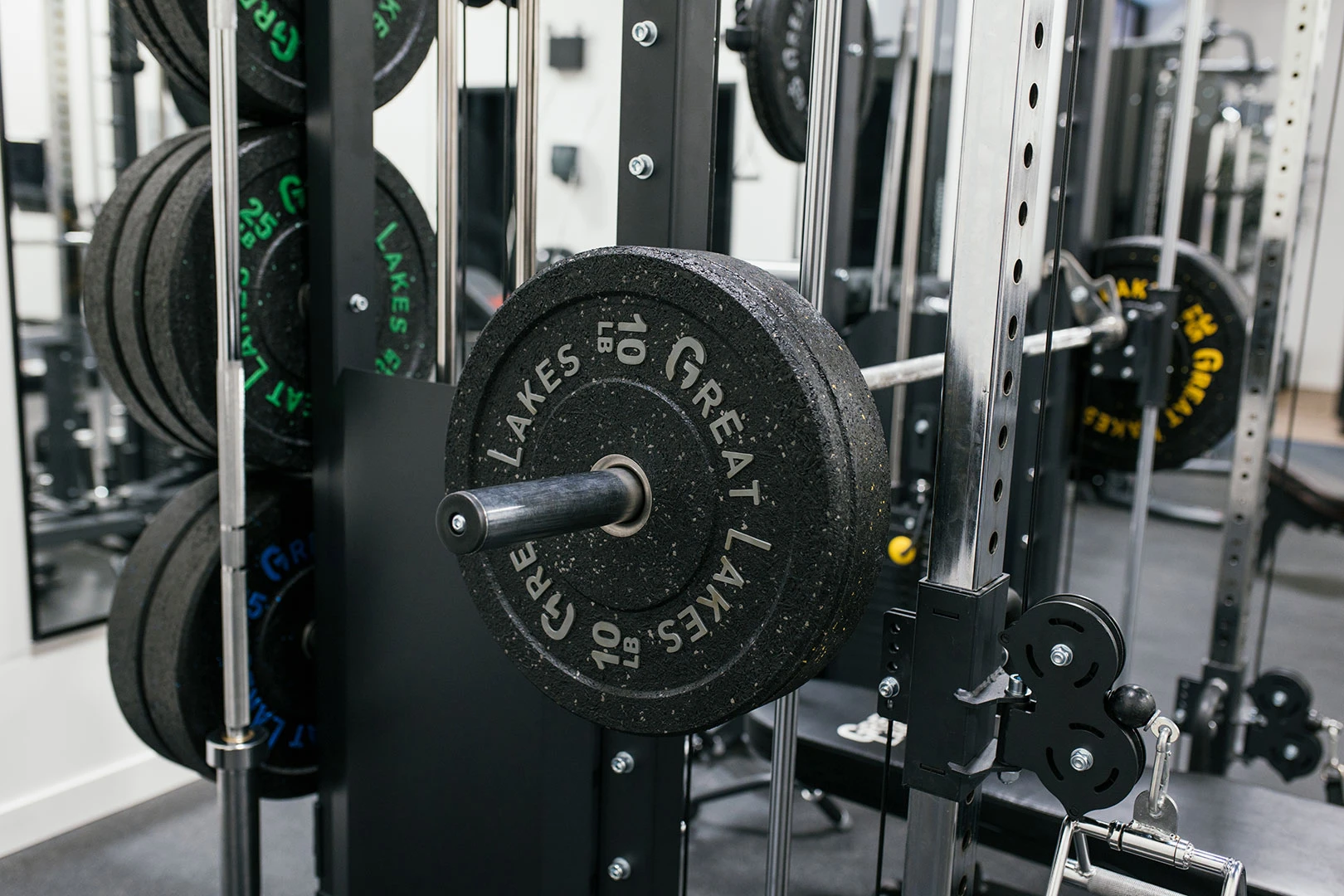 A photo of various weights and gym equipment in the Brand Blvd gym.
